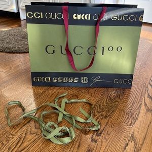 Empty Large Gucci shopping bag with ribbon